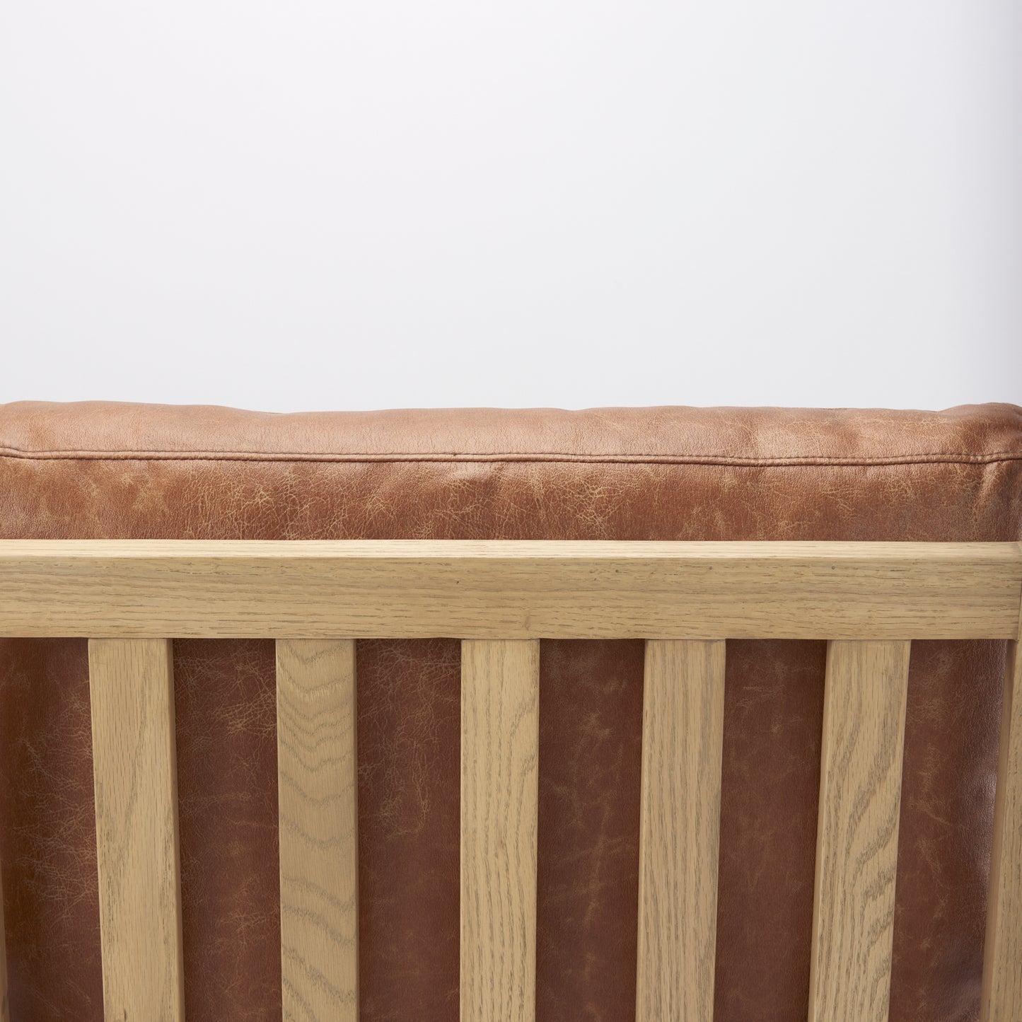 Raeleigh Tan Faux Leather Accent Chair