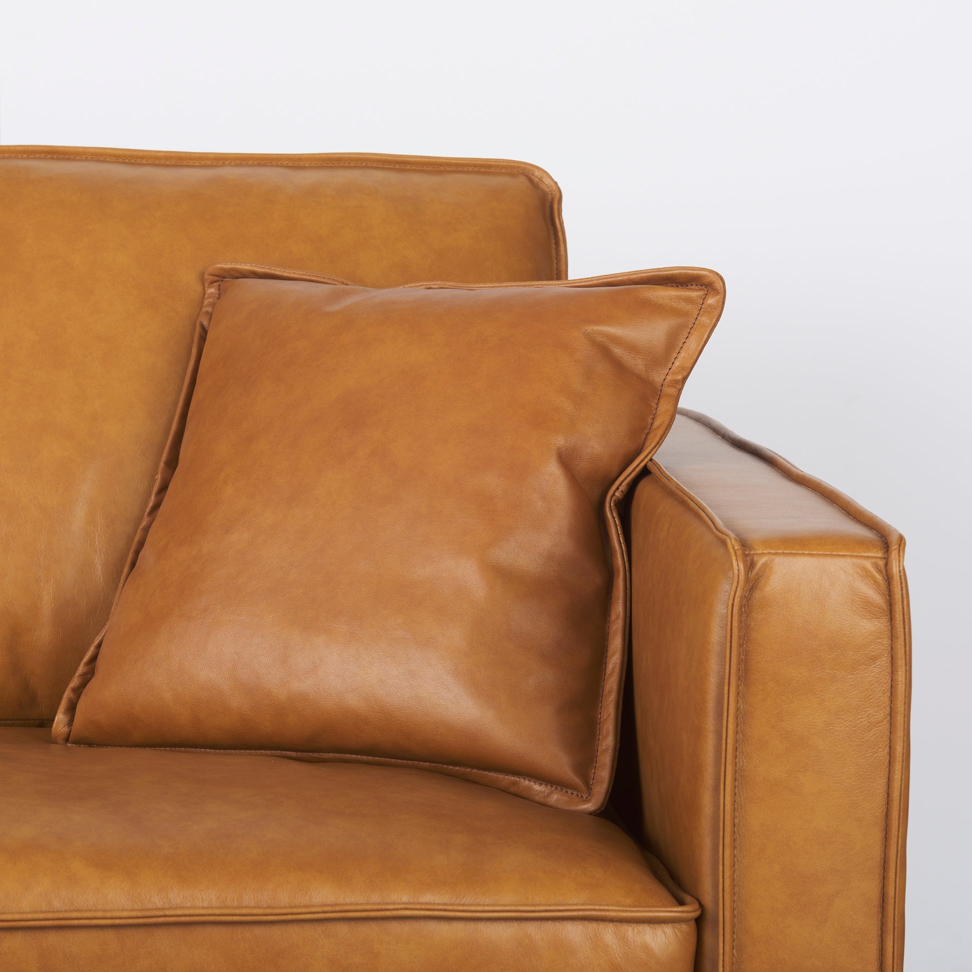 D'Arcy 111"L x 70"D x 33"H Tan Leather Left Chaise Sectional