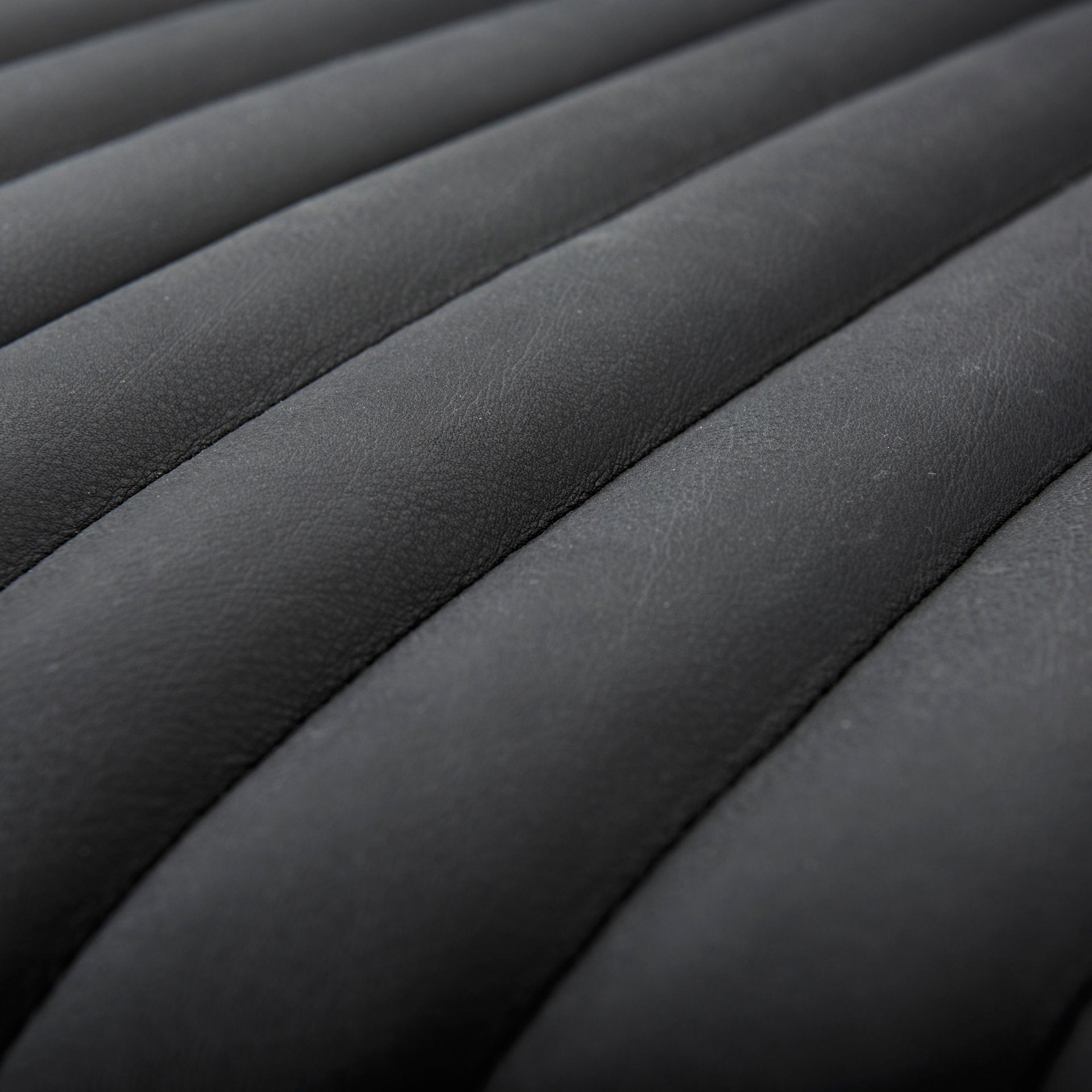 Ricciardo Black Leather Wrapped Three Seater Sofa